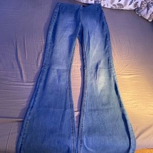 Size 0. 80’s style flare pants. Bought at Zen Island.
